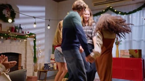 Everyone dancing, grandpa clapping.