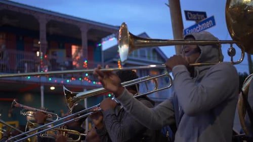Trombone close, the French Quarter behind.