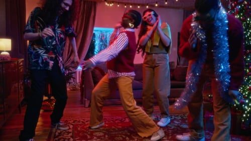 Friends dancing at the party.