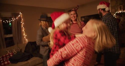 Dancing in the living room, hats flying.