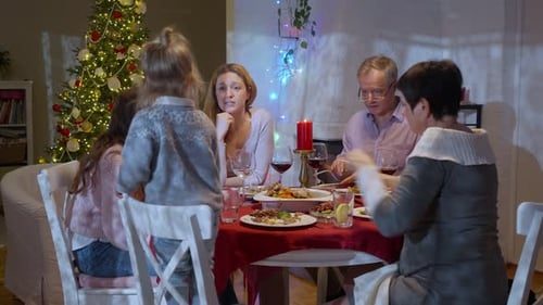 The whole family around the festive table.