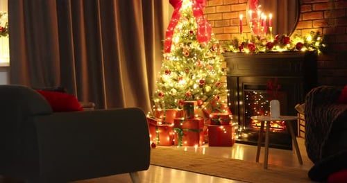The living room at night, tree and fireplace glowing. The title sits on this.
