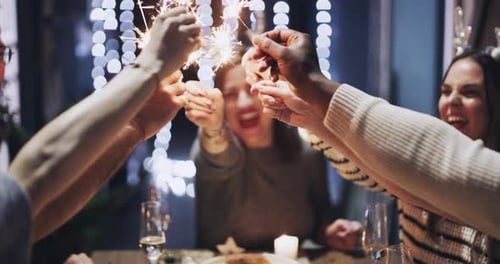 Everyone's sparklers meet in the middle.
