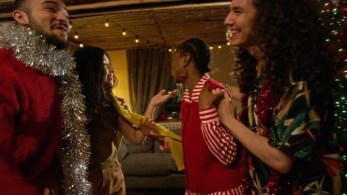 Friends dancing at the house party.
